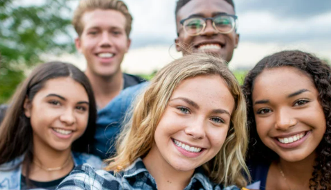 Smiling teenagers.